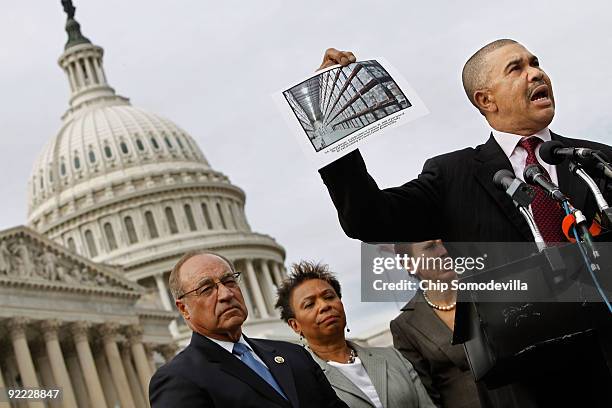 House Subcommittee on Information Policy, Census and National Archives Chairman Lacy Clay holds up a photograph of some of the 425 million 2010...