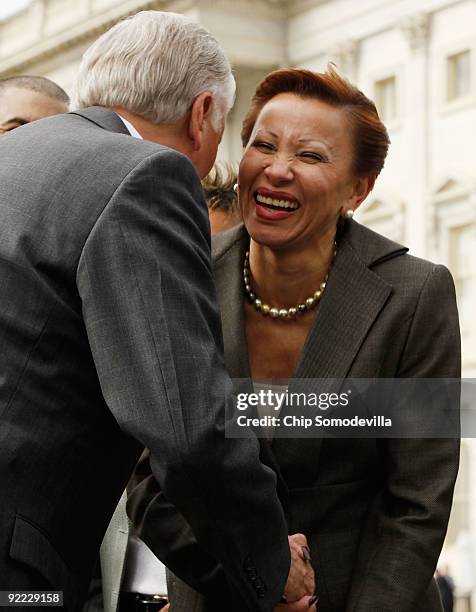 Congressional Hispanic Caucus chair Rep. Nydia Velazquez greets House Majority Leader Steny Hoyer during a news conference outside the U.S. Capitol...