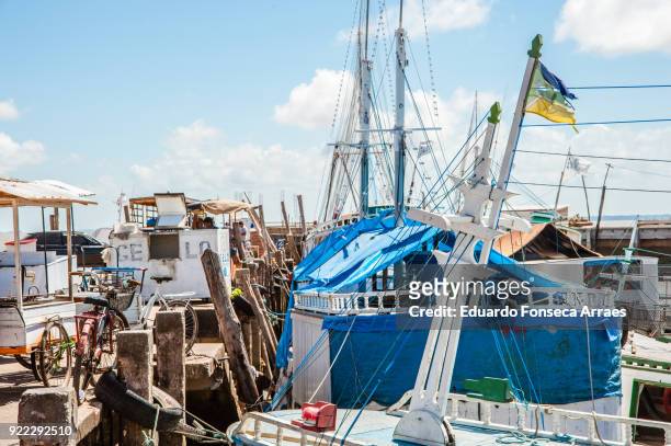 fishing boats on the amazon river - equator line stock pictures, royalty-free photos & images