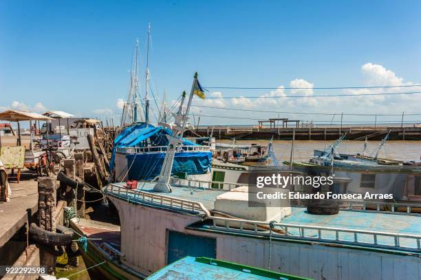 fishing boats on the amazon river - equator line stock pictures, royalty-free photos & images