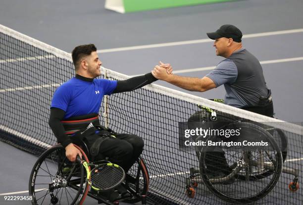 Gary Cox of Great Britain and Greg Hasterok of USA shake hands at the end of their match during the 2018 Bolton Indoor Wheelchair Tennis Tournament...