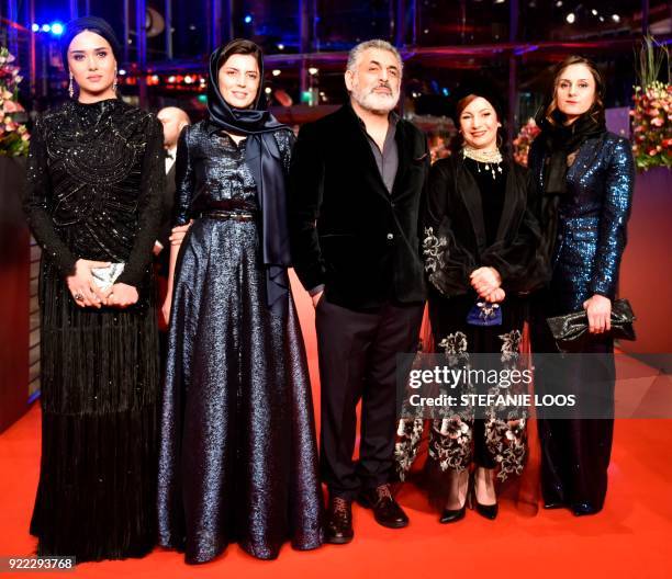 Iranian actress Parinaz Izadyar, Iranian actress Leila Hatami, Iranian producer Mani Haghighi, Iranian actress Leili Rashidi pose on the red carpet...