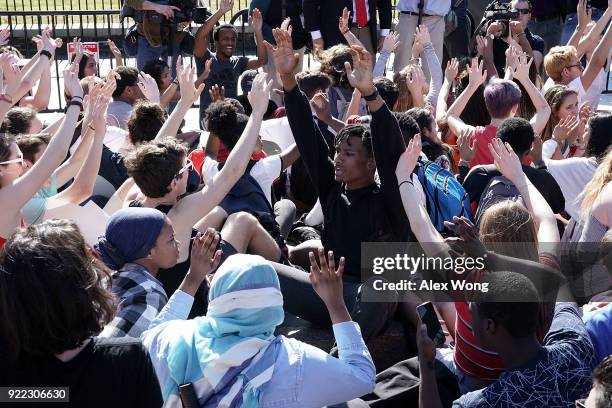 Students hold up their hands as they participate in a protest against gun violence February 21, 2018 outside the White House in Washington, DC....