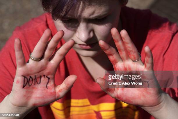 Student participates in a protest against gun violence February 21, 2018 outside the White House in Washington, DC. Hundreds of students from a...