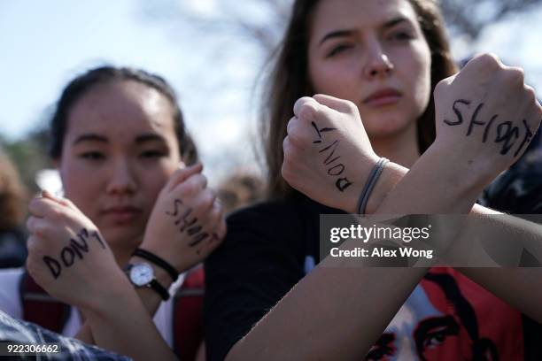 Students participate in a protest against gun violence February 21, 2018 on Capitol Hill in Washington, DC. Hundreds of students from a number of...