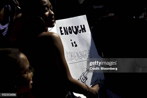 Demonstrator holds a sign reading "Enough is Enough" while protesting gun violence outside the White House in Washington, D.C., U.S., on Wednesday,...