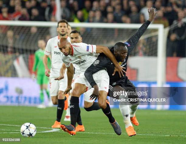 Sevilla's French midfielder Steven N'Zonzi fights for the ball with Manchester United's Belgian forward Romelu Lukaku during the UEFA Champions...