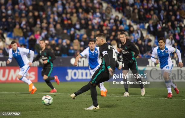 Sergio Ramos of Real Madrid scores Real's third goal from the penalty spot during the La Liga match between Leganes and Real Madrid at Estadio...