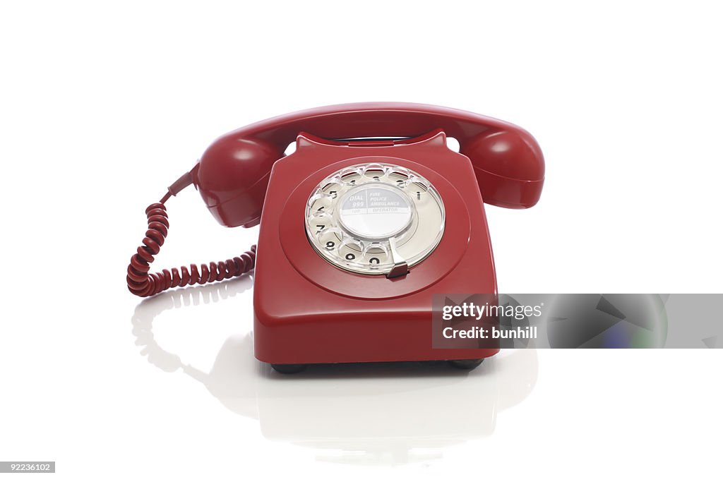 Classic Red Plastic Rotary Dial Telephone Receiver On White