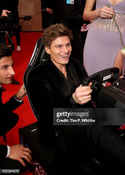 Mitch Evans and Oliver Cheshire compete on the Formula E Simulators at the BRITS official aftershow party, in partnership with Tempus Magazine, at...