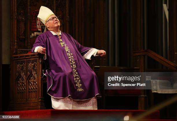 Cardinal Timothy Dolan pauses at St. Patrick's Cathedral during a memorial Mass is held for NYPD Officer Edward Byrne almost 30 years after he was...