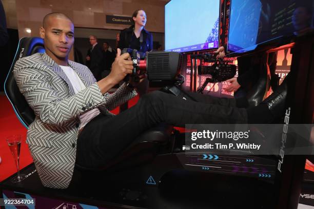 Sacha M'Baye competes on the Formula E Simulators at the BRITS official aftershow party, in partnership with Tempus Magazine, at the Intercontinental...