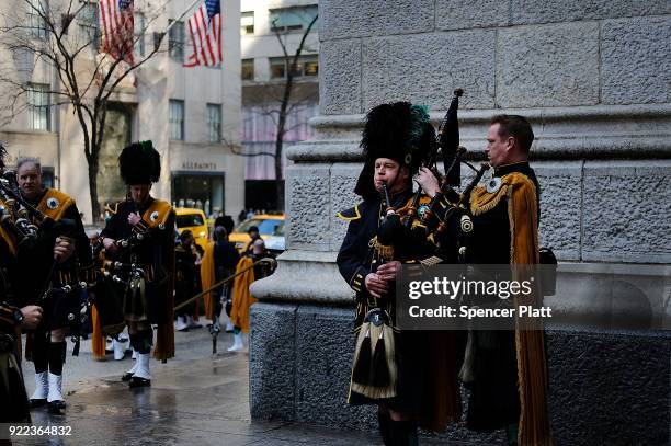 Counter terrorism police stand guard outside of St. Patrick's Cathedral as a memorial Mass is held for NYPD Officer Edward Byrne almost 30 years...