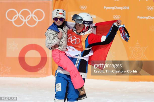 Marie Martinod of France after winning the silver medal celebrates with daughter Melirose during the Freestyle Skiing - Ladies' Ski Halfpipe Final at...