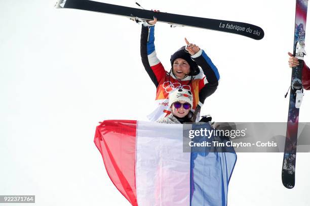 Marie Martinod of France after winning the silver medal celebrates with daughter Melirose during the Freestyle Skiing - Ladies' Ski Halfpipe Final at...