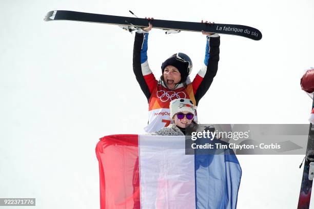 Marie Martinod of France after winning the silver medal celebrates with daughter Melirose during the Freestyle Skiing - Ladies' Ski Halfpipe Final at...