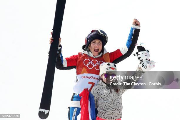 Marie Martinod of France after winning the silver medal celebrates with daughter Melirose during the Freestyle Skiing - Ladies' Ski Halfpipe Final at...