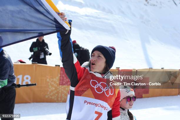 Marie Martinod of France after winning the silver medal celebrates with daughter Melirose during the Freestyle Skiing - Ladies' Ski Halfpipe Final at...