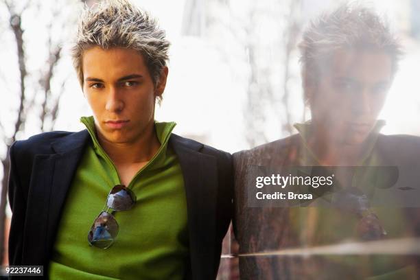 attractive with reflection - spiky hair stock pictures, royalty-free photos & images