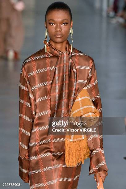 Model walks the runway at the Mother of Pearl Ready to Wear Fall/Winter 2018-2019 fashion show during London Fashion Week February 2018 on February...