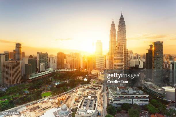 city of kuala lumpur in malaysia. view central of kuala lumpur at the sunset - kuala lumpur road stock pictures, royalty-free photos & images