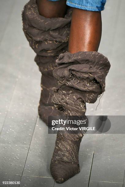 Model walks the runway at the Faustine Steinmetz Ready to Wear Fall/Winter 2018-2019 fashion show during London Fashion Week February 2018 on...