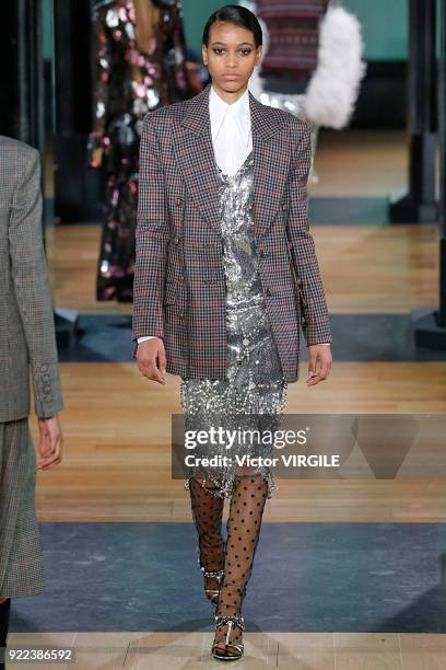 Model walks the runway at the ERDEM Ready to Wear Fall/Winter 2018-2019 fashion show during London Fashion Week February 2018 on February 19, 2018 in...