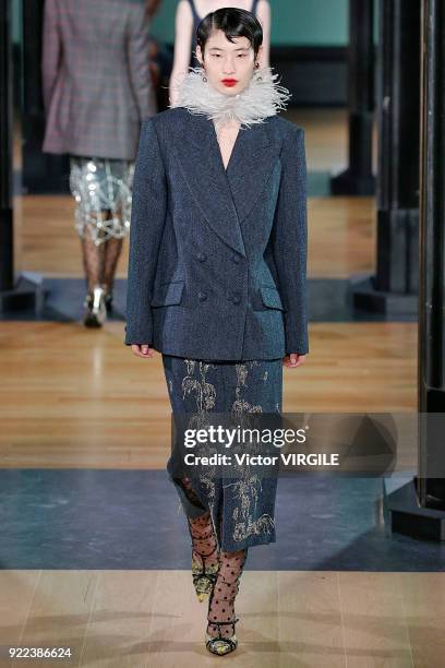 Model walks the runway at the ERDEM Ready to Wear Fall/Winter 2018-2019 fashion show during London Fashion Week February 2018 on February 19, 2018 in...