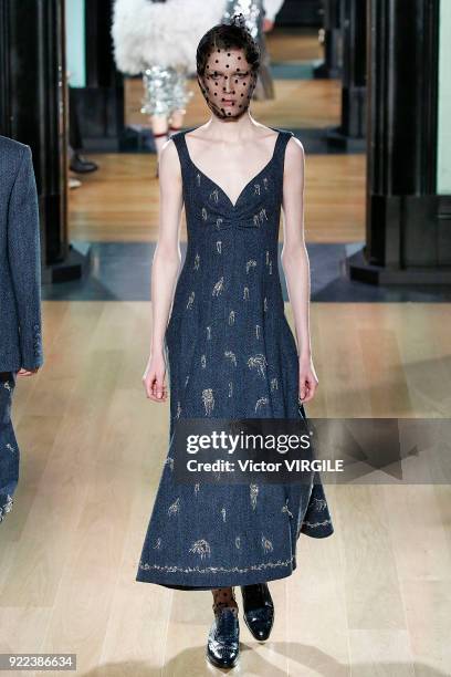 Model walks the runway at the ERDEM Ready to Wear Fall/Winter 2018-2019 fashion show during London Fashion Week February 2018 on February 19, 2018 in...