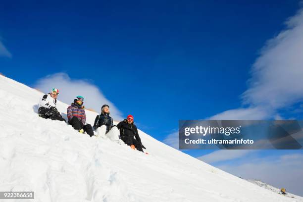 skiing happy skier class on the mountain top amateur winter sports  alpine skiing. group of skiers. best friends men and women, snow skiers  enjoying on sunny ski resorts.  high mountain snowy landscape. - amateur photography stock pictures, royalty-free photos & images