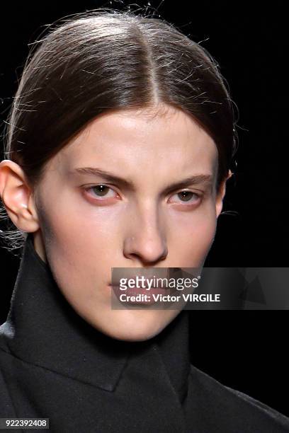 Model walks the runway at the Christopher Kane Ready to Wear Fall/Winter 2018-2019 fashion show during London Fashion Week February 2018 on February...