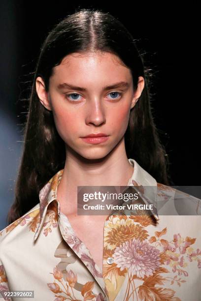 Model walks the runway at the Christopher Kane Ready to Wear Fall/Winter 2018-2019 fashion show during London Fashion Week February 2018 on February...