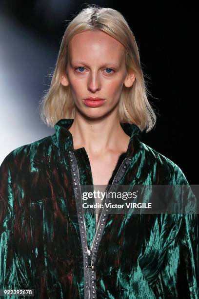 Model walks the runway at the Christopher Kane Ready to Wear Fall/Winter 2018-2019 fashion show during London Fashion Week February 2018 on February...