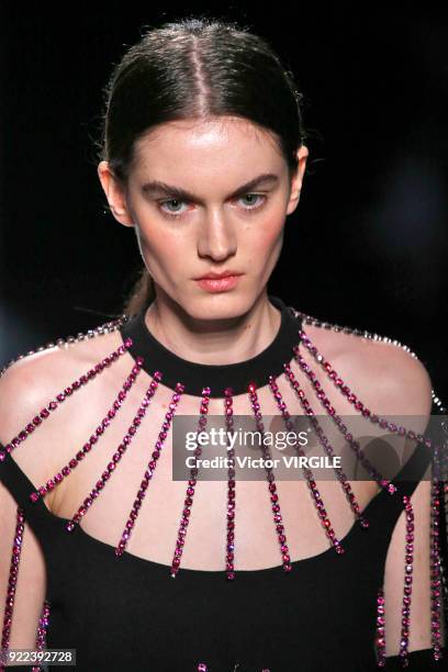 Model walks the runway at the Christopher Kane Ready to Wear Fall/Winter 2018-2019 fashion show during London Fashion Week February 2018 on February...