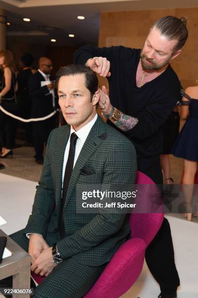 Paul Sculfor has his hair styled by hairdresser Lee Stafford ahead of the BRITS official aftershow party, in partnership with Tempus Magazine, at the...