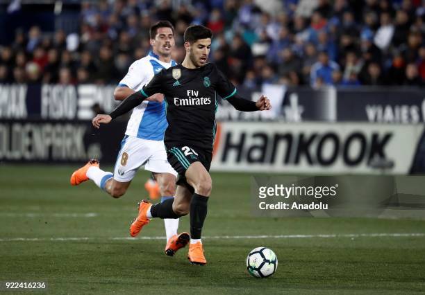 Marco Asensio of Real Madrid in action against Gabriel of Leganes during the La Liga football match between Leganes and Real Madrid at the Estadio...