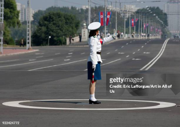 North Korean female traffic security officer in white uniform in the street, Pyongan Province, Pyongyang, North Korea on September 12, 2008 in...