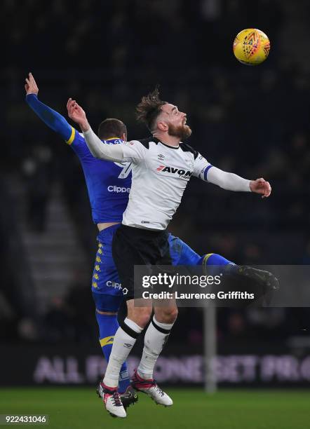 Pierre-Michel Lasogga of Leeds battles Richard Keogh of Derby County during the Sky Bet Championship match between Derby County and Leeds United at...