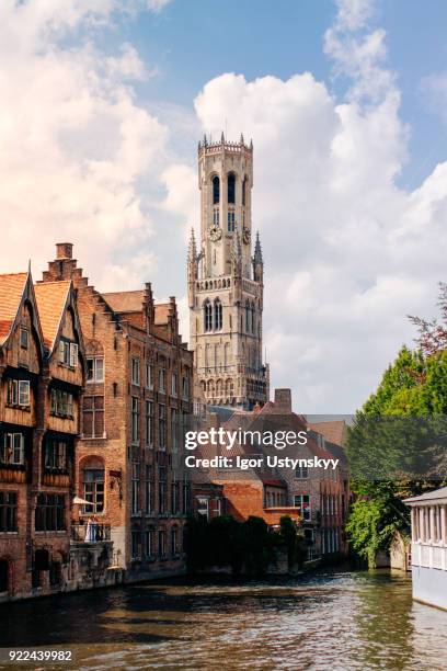 canal view of picturesque medieval bruges - bruges stock pictures, royalty-free photos & images