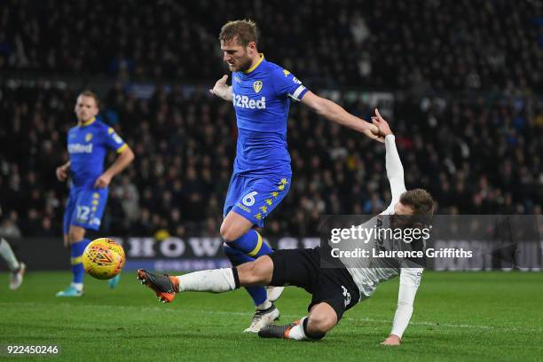 Liam Cooper of Leeds United in action with Andreas Weimann of Derby County during the Sky Bet Championship match between Derby County and Leeds...