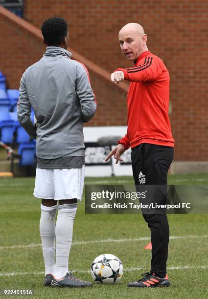 Manchester United coach Nicky Butt speaks with one of his players before the Liverpool v Manchester United UEFA Youth League game at Prenton Park on...