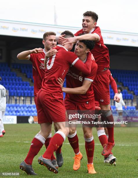 Ben Woodburn of Liverpool celebrates his goal with team mates Herbie Kane, Curtis Jones and Adam Lewis during the Liverpool v Manchester United UEFA...