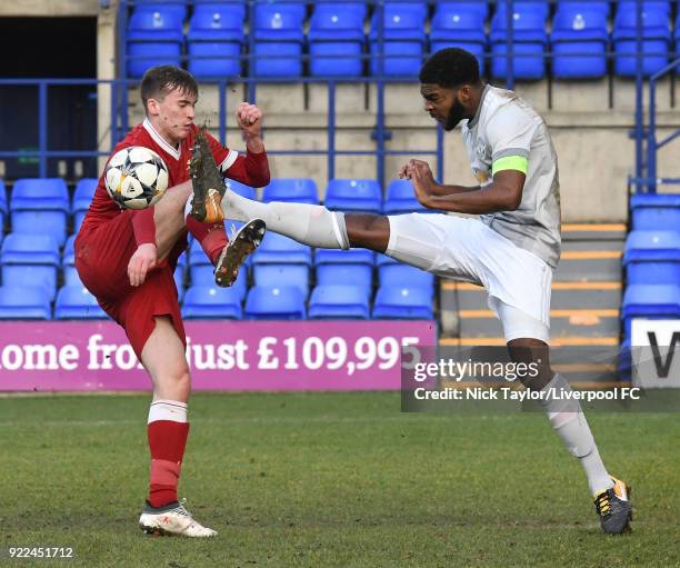 Liam Millar of Liverpool and Ro-Shaun Williams of Manchester United in action during the Liverpool v Manchester United UEFA Youth League game at...