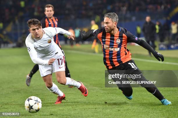 Roma's Turkish midfielder Cengiz Under vies for the ball with Shakhtar Donetsk's midfielder Marlos during the UEFA Champions League round of 16 first...