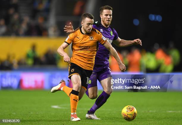 Diogo Jota of Wolverhampton Wanderers and Marley Watkins of Norwich City during the Sky Bet Championship match between Wolverhampton Wanderers and...