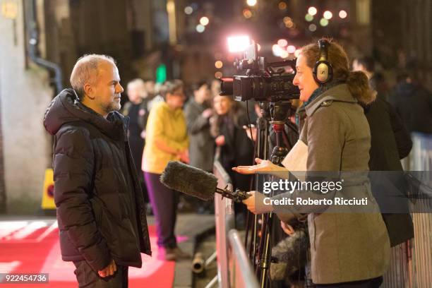 Producer Jeremy Dawson gives an interview during the UK premiere of 'Isle of Dogs' and opening gala of the 14th Glasgow Film Festival at Glasgow Film...
