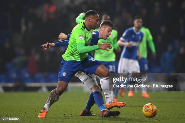 Cardiff City's Kenneth Zohore and Ipswich Town's Adam Webster during the Sky Bet Championship match at Portman Road, Ipswich.