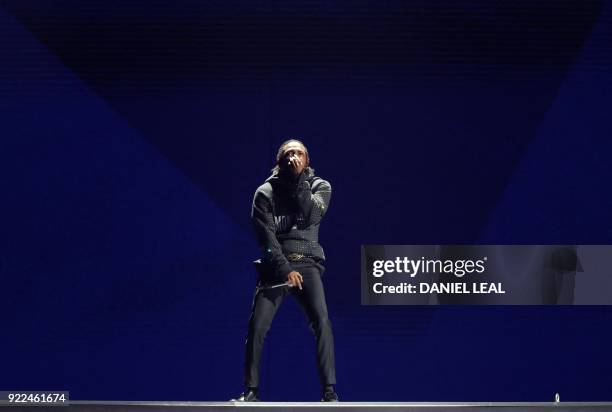 Singer-songwriter and rapper Kendrick Lamar performs during the BRIT Awards 2018 ceremony and live show in London on February 21, 2018. - RESTRICTED...