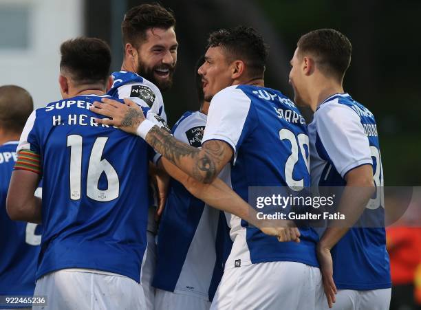 Porto forward Tiquinho Soares from Brazil celebrates with teammates after scoring a goal during the Primeira Liga match between GD Estoril Praia and...