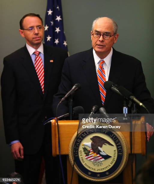 Mike McKay, National Association of Former U.S. Attorneys, with U.S. Deputy Attorney General Rod Rosenstein behind him, speaks at a press conference...